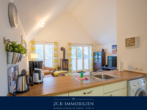 hohe Räume! - 2 Zimmer Premium Ferienwohnung in Glowe, strandnah, zwei Balkone, Sauna, Kamin, inkl. Stellplatz!