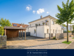 Ansicht von der Straße - Premiumhaus in Top-Lage von Göhren: Exklusives Massivhaus mit Einliegerwohnung zur Ferienvermietung!