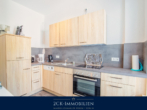 Einbauküche - stilvoll und zentral: 3-Zimmer-Ferienwohnung im Hochparterre, 88 m², großer Balkon, Stellplatz inkl.