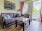 Wohnbereich mit Balkon - 2,5 Zimmer Ferien-Schmuckstück Bestlage im Seepark Sellin, 1. Etage, Tiefgaragenplatz inkusive!