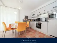 Essbereich mit Einbauküche