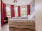 Schlafzimmer - Über 200 Buchungstage! 2,5 Zimmer Ferienwohnung im Seepark Sellin, 1. Etage, Tiefgaragenplatz inkl!