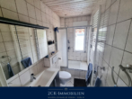 Badezimmer EG - Ihr Traumhaus in Blankenfelde: Modern, großzügig, mit Pool, Garage & viel Platz für die Familie!