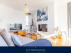 Wohnberiech mit Kamin - Binzer Luxus Penthouse 129 m², 360° Terrasse, Sauna, Kamin, Meerblick, Strandpromenade, Stellplatz!
