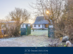 Einfahrt - Rügen authentisch erleben: Zwei Häuser, ein Grundstück und der Blick auf den Bodden!