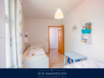 Schlafzimmer II - Stilvoll und zentral: 3-Zimmer-Ferienwohnung, 88 m², großer Balkon, Stellplatz, im Ostseebad Göhren!