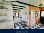 Flurbereich mit Küchenansicht - Reetferienhaus für Erholungssuchende, direkt an der Küste, Idylle, Ruhe, nur 550 m zum Ostseestrand!