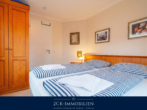 Schlafzimmer - Ferienwohnung mit Top-Auslastung, 25 m² Terrasse, Strandkorb & Poolnutzung – nur 100 m zum Strand!