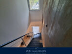 Exklusives Traumhaus im Bauhausstil auf 950m² gepflegtem Grundstück in ruhiger Lage in Glowe! - Treppenaufgang