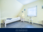 Schlafzimmer III - Einzigartig und unverbaubar: Ferienhaus mit Boddenblick und Sonnenuntergang in Breege!