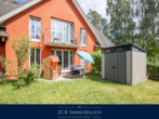 mit Gartenhaus