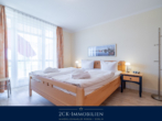 Schlafzimmer mit Meerblick - Meerblick ohne Umwege: 2 Zimmer Ferienwohnung im Ostseebad Göhren, Stellplatz inklusive!