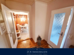 Flubereich Badezimmer - Einfamilienhaus auf zwei Ebenen mit großem, pflegeleichten Garten, Wintergarten, Terrasse, Garage!