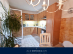 Blick in die Küche - Einfamilienhaus auf zwei Ebenen mit großem, pflegeleichten Garten, Wintergarten, Terrasse, Garage!