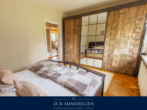 Schlafzimmer EG - Einfamilienhaus auf zwei Ebenen mit großem, pflegeleichten Garten, Wintergarten, Terrasse, Garage!