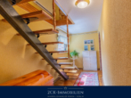 Treppe ins UG - Einfamilienhaus auf zwei Ebenen mit großem, pflegeleichten Garten, Wintergarten, Terrasse, Garage!