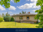 Rückansicht - Einfamilienhaus auf zwei Ebenen mit großem, pflegeleichten Garten, Wintergarten, Terrasse, Garage!