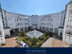 Blick in den Hof - Zwischen Hafen und Meer! moderne 2 Zimmer Ferienwohnung im Seepark Ostseebad Sellin Stellplatz inkl.