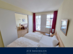 Schlafzimmer mit Balkonzugang - Zwischen Hafen und Meer! 2 Zimmer Ferienwohnung im Ostseebad Sellin, inkl. Stellplatz!